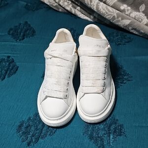 Alexander McQueen White Leather Oversized Sole Sneakers with Gold Heel Accent